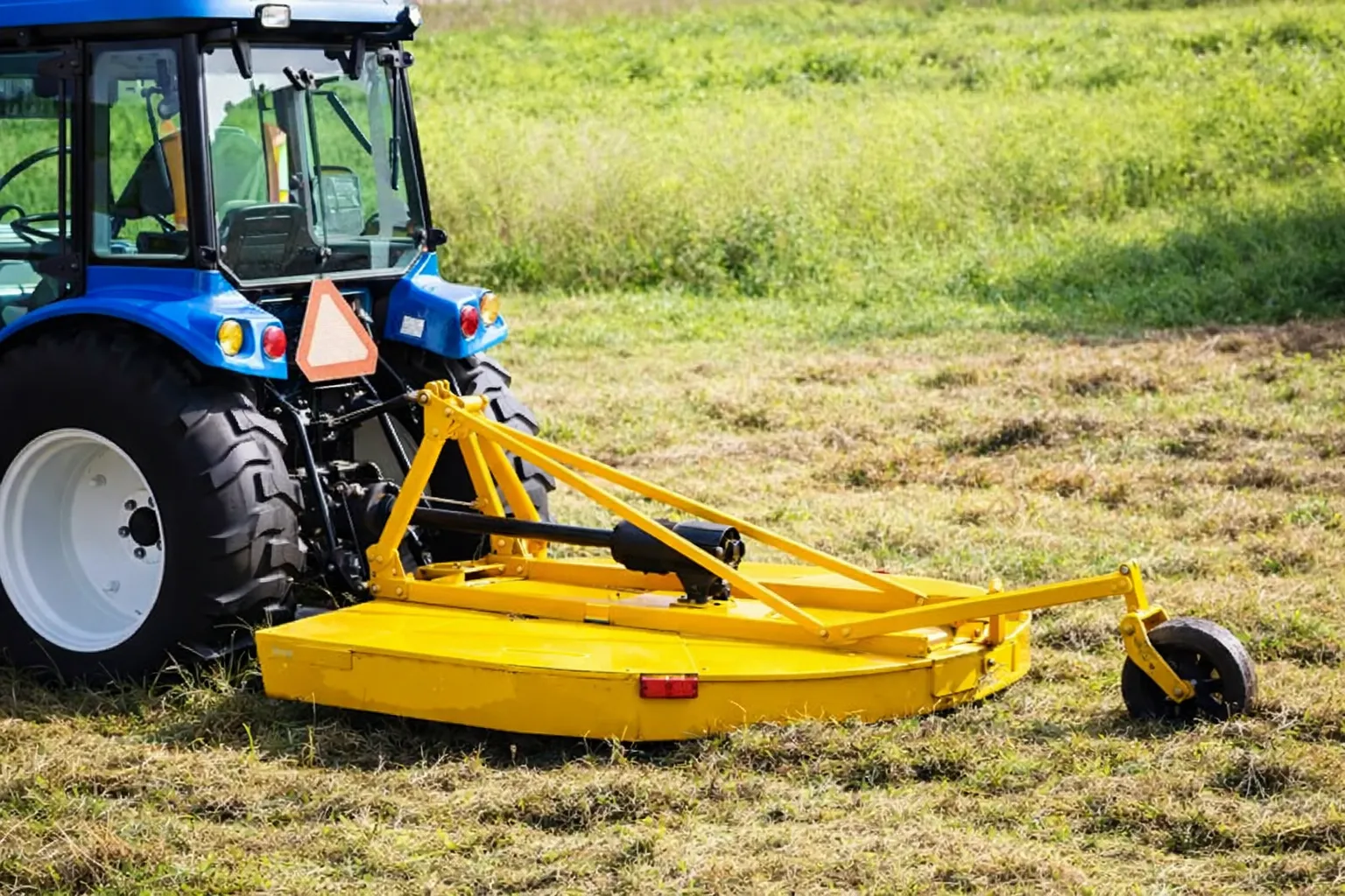 Rotary slasher driven by PTO shaft in Queensland pasture
