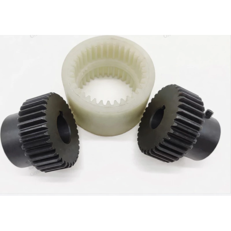 NL nylon gear flexible coupling components showing hub halves and internal gear nylon sleeve separately